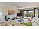 Relaxing living room with comfortable seating and sliding doors to balcony at 3001 S Atlantic Ave # 502, New Smyrna Beach, FL 32169