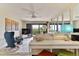 Spacious living room with comfortable seating and ocean views at 3001 S Atlantic Ave # 502, New Smyrna Beach, FL 32169