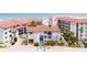 Aerial view of beachfront condos with ocean views and community pool at 3001 S Atlantic Ave # 502, New Smyrna Beach, FL 32169
