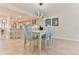 Light and airy dining room with seating for six at 3001 S Atlantic Ave # 502, New Smyrna Beach, FL 32169