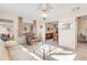 Relaxing living room with comfy seating and view to dining area at 535 S Peninsula Ave, New Smyrna Beach, FL 32169