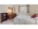 Bedroom with dresser, carpet, and window coverings at 535 S Peninsula Ave, New Smyrna Beach, FL 32169