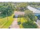 Aerial view of a single story home with a large yard at 535 S Peninsula Ave, New Smyrna Beach, FL 32169
