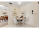 Cozy breakfast nook with a small table and four chairs at 535 S Peninsula Ave, New Smyrna Beach, FL 32169