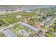 Aerial view showing home, pool, and neighborhood at 535 S Peninsula Ave, New Smyrna Beach, FL 32169