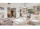 Bright living room with built-in shelves and home office at 535 S Peninsula Ave, New Smyrna Beach, FL 32169