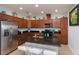 Spacious kitchen with an island and stainless steel appliances at 933 Attitude Ave, Daytona Beach, FL 32124