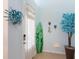 Bright and airy entryway with coastal decor at 933 Attitude Ave, Daytona Beach, FL 32124