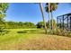 Large backyard with fenced dog run and open space at 756 Bay Dr, New Smyrna Beach, FL 32168