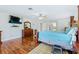 Bedroom with king-size bed and hardwood floors at 756 Bay Dr, New Smyrna Beach, FL 32168