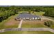 House with a driveway and large green yard at 756 Bay Dr, New Smyrna Beach, FL 32168