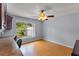 Bright home office with backyard view and built-in workspace at 1328 Needle Palm Dr, Edgewater, FL 32132