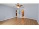Bright bedroom with laminate flooring and access to bathroom at 1328 Needle Palm Dr, Edgewater, FL 32132