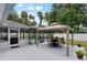 Relaxing backyard oasis with a gazebo, patio, and pool at 1328 Needle Palm Dr, Edgewater, FL 32132