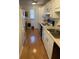 Efficient kitchen with white cabinets at 101 N Riverside Dr # 611, New Smyrna Beach, FL 32168