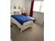 Cozy bedroom with twin bed and decor at 101 N Riverside Dr # 611, New Smyrna Beach, FL 32168