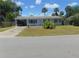 Single story home with carport and fenced yard at 1846 Royal Palm Dr, Edgewater, FL 32141