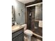 Updated bathroom with walk-in shower and vanity at 2100 N Peninsula Ave # 1050, New Smyrna Beach, FL 32169