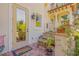 Ground level entrance with patio furniture and landscaping at 5090 Riverside Dr # 105, Port Orange, FL 32127