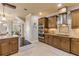 Open kitchen boasts stainless steel appliances and granite countertops at 5090 Riverside Dr # 105, Port Orange, FL 32127
