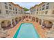 Aerial view of community pool and courtyard at 5090 Riverside Dr # 105, Port Orange, FL 32127