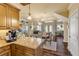 Kitchen with granite countertops, view into dining area at 5090 Riverside Dr # 105, Port Orange, FL 32127