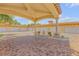 Shared covered parking area with brick pavers and fountain at 5090 Riverside Dr # 105, Port Orange, FL 32127