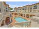 Courtyard pool with surrounding building and stairs at 5090 Riverside Dr # 105, Port Orange, FL 32127