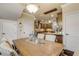 Dining area with kitchen view and hardwood floors at 5090 Riverside Dr # 105, Port Orange, FL 32127