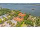 Aerial view of waterfront property with building and parking at 5090 Riverside Dr # 105, Port Orange, FL 32127