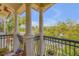 Private balcony offering scenic views and lush greenery at 5090 Riverside Dr # 105, Port Orange, FL 32127