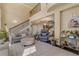 Bright living room with high ceilings and hardwood floors at 5090 Riverside Dr # 105, Port Orange, FL 32127