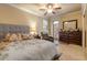 Bedroom with a comfortable bed and access to balcony at 5090 Riverside Dr # 105, Port Orange, FL 32127