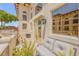 Serene balcony featuring seating and lush landscaping at 5090 Riverside Dr # 105, Port Orange, FL 32127