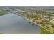 Aerial view of waterfront property and town at 5090 Riverside Dr # 105, Port Orange, FL 32127