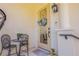 Front door entryway with small table and chairs at 5090 Riverside Dr # 105, Port Orange, FL 32127