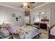 Bedroom with mirrored closet doors and a comfortable bed at 5090 Riverside Dr # 105, Port Orange, FL 32127