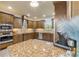 Modern kitchen with granite countertops and stainless steel appliances at 5090 Riverside Dr # 105, Port Orange, FL 32127