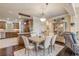 Open concept dining area with kitchen and living room views at 5090 Riverside Dr # 105, Port Orange, FL 32127