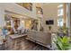 Open living area with hardwood floors and kitchen view at 5090 Riverside Dr # 105, Port Orange, FL 32127
