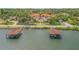 Waterfront property with Mediterranean-style building and boat docks at 5090 Riverside Dr # 105, Port Orange, FL 32127