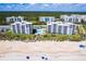 Aerial view of beachfront condo building with pool and ocean views at 5301 S Atlantic Ave # 630, New Smyrna Beach, FL 32169
