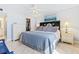 Main bedroom with king-size bed, dresser, and ocean view at 5301 S Atlantic Ave # 630, New Smyrna Beach, FL 32169