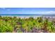 Oceanfront view with lush vegetation at 5301 S Atlantic Ave # 630, New Smyrna Beach, FL 32169