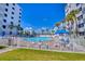 Inviting pool with surrounding patio furniture at 5301 S Atlantic Ave # 630, New Smyrna Beach, FL 32169