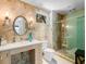 Spa-like bathroom with walk-in shower and modern vanity at 1006 S Riverside Dr, Edgewater, FL 32132