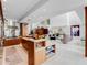Open concept kitchen with island and living room view at 1006 S Riverside Dr, Edgewater, FL 32132