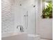 Spa-like bathroom with a large walk-in shower and modern bathtub at 1006 S Riverside Dr, Edgewater, FL 32132