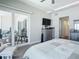 Serene main bedroom with king bed and private balcony access at 807 S Atlantic Ave # 302, New Smyrna Beach, FL 32169