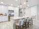 Modern kitchen with white cabinets and island at 807 S Atlantic Ave # 302, New Smyrna Beach, FL 32169